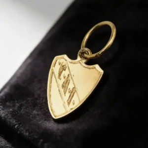 Dije Oro 18 K Escudo Independiente Chico 0,3 Gramos